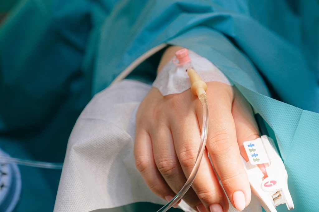 Patient's hand with IV drip