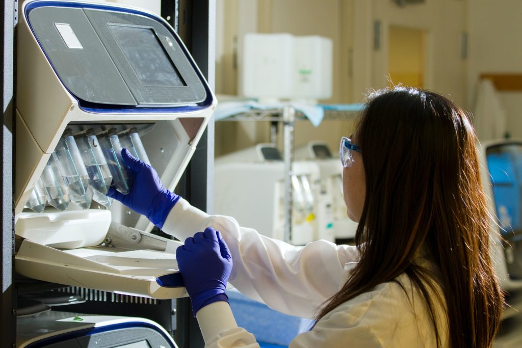 Woman using lab equipment