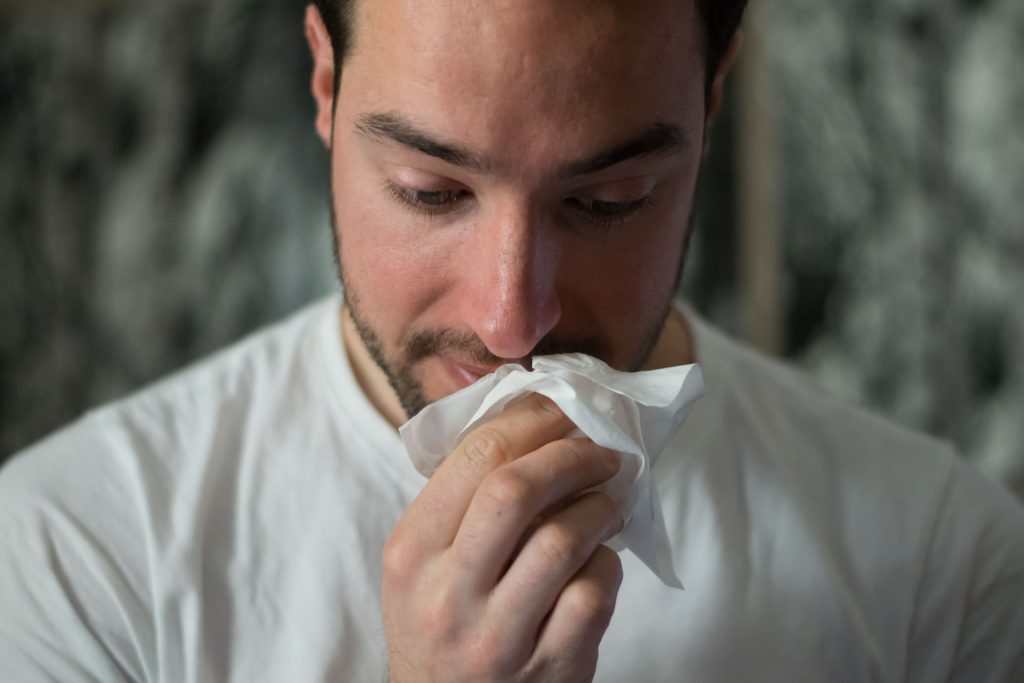 Runny nose and sneezing symptoms